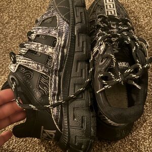 Worn Authentic Versace women shoes missing the inside cushions sorry